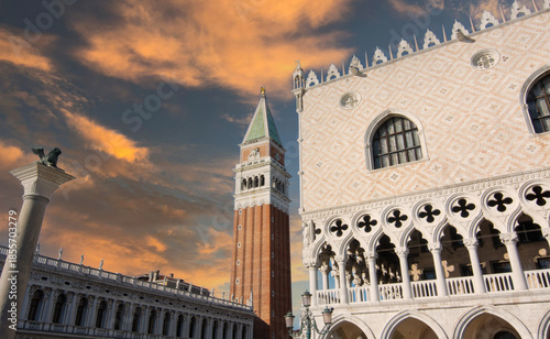 Venice, with the Doge's Palace and St. Mark's Bell Tower standing out against a dramatic sky