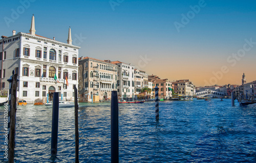 The Grand Canal in Venice at sunset. It is crossed by four bridges: the Rialto Bridge is one of these.