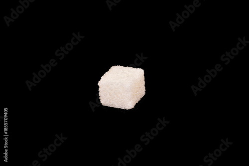 sugar isolated on black background