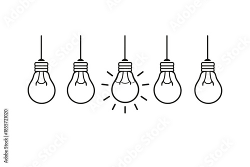 One lit light bulb among many unlit