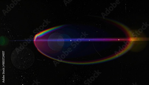A lens flare arc glows over a black background with a few dust spots
