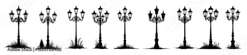 Ornate street lamps with grass silhouettes lamppost