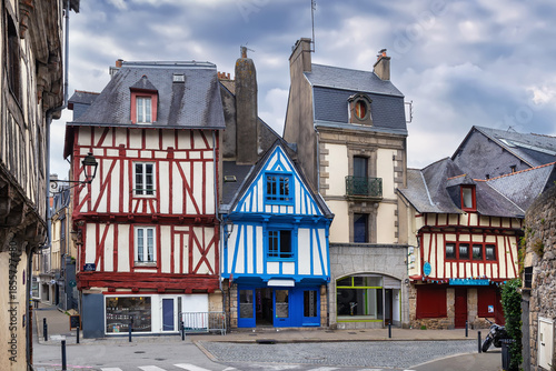 Street with historical half-timbered house in Vannes, France