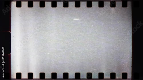 Vintage 35mm Film Frame Overlay with Sprocket Holes and Grain.