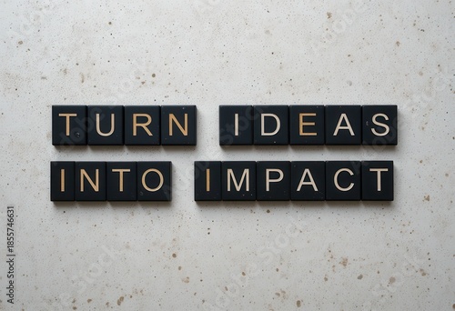 Inspirational Message with Black and White Letter Tiles on Stone Background