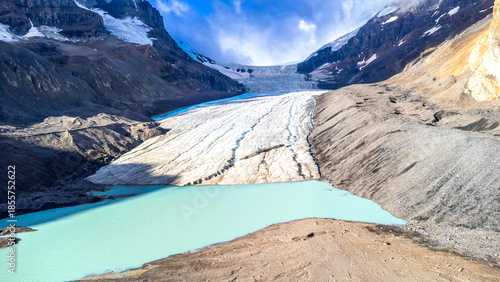 Photos Athabasca glacier melting into turquoise lake in jasper national park