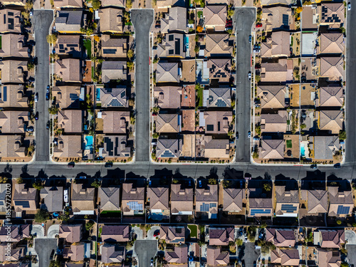Top down aerial view of residential neighborhood streets in Los Angeles, showing organized housing blocks and suburban road patterns