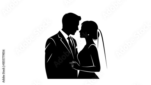 Silhouette of a bride and groom in wedding attire.