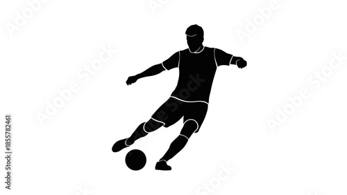 Silhouette of a soccer player kicking a ball in action.