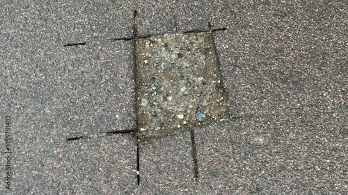 Place of selection of the kernel in the form of a rectangular from asphalt concrete pavement. Kern. Close-up
