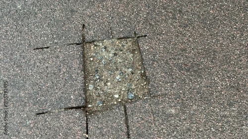 Place of selection of the kernel in the form of a rectangular from asphalt concrete pavement. Kern. Close-up
