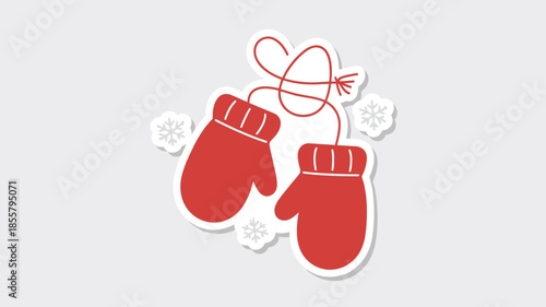 Vibrant red winter mittens with snowflakes for cozy cold weather