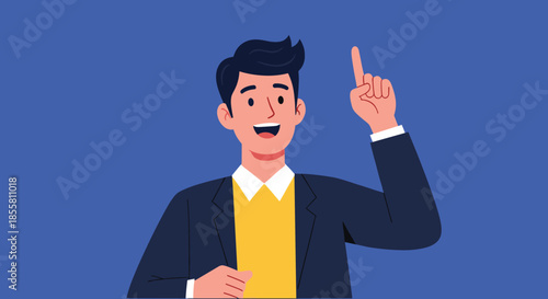 Young businessman in a suit smiles and points his finger upward as he has a great idea or innovative business solution.