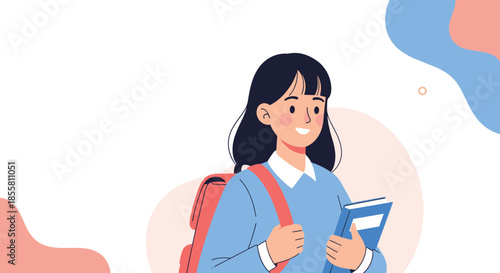 Happy and cheerful schoolgirl with a backpack and a book in her hands is ready to go back to school for a new lesson.