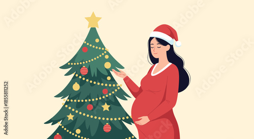 Happy pregnant woman in a red dress and santa hat is decorating a beautiful Christmas tree for the winter holiday season.