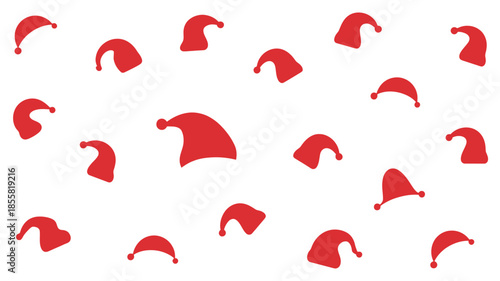 Vibrant red Santa hats scattered on white background for Christmas
