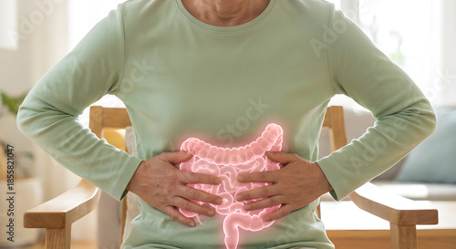 Wallpaper Mural woman with stomach pain and glowing pink intestines Torontodigital.ca