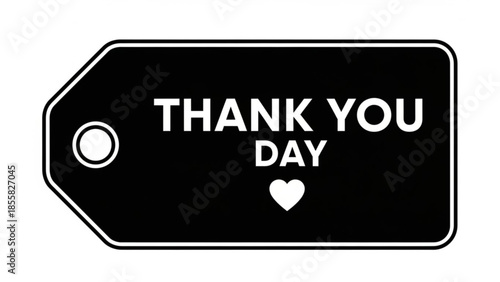 Black tag with white text thank you day and heart symbol on white background