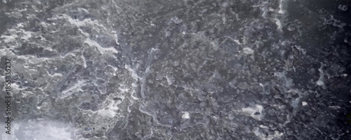 Ice breaking is the sign of weather changing from freezing cold to warmer. Ice surface on the river with daylight in winter.