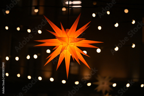 Glowing Christmas star on a dark background