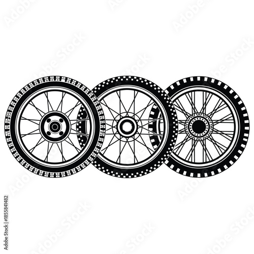 Three black and white motorcycle wheels displayed in a close up arrangement