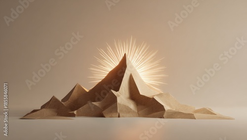 Abstract beige mountain peak illuminated by a golden sunburst