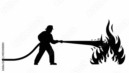 Firefighter silhouette spraying water on a large fire.