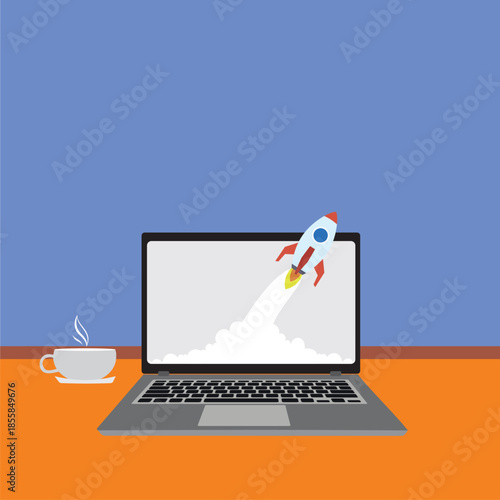 laptop with rocket on the screen