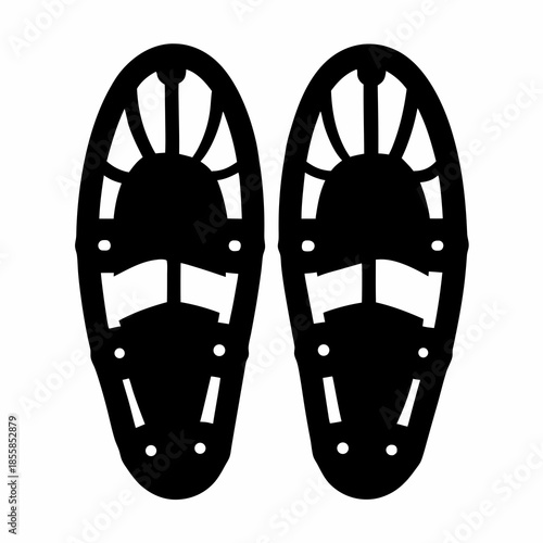 Two snowshoes for walking on the snow in black and white design