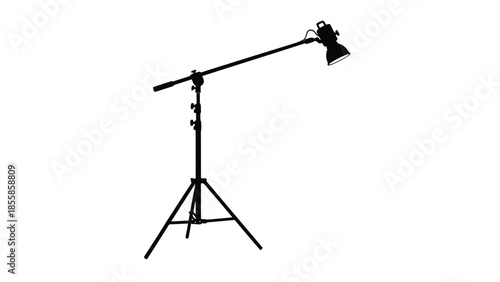 Black silhouette of a studio light on a stand isolated on white background