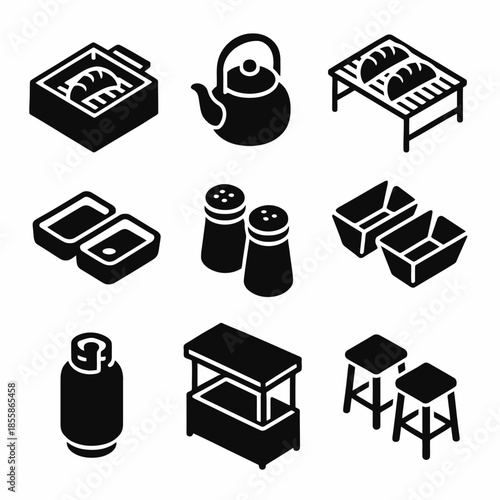 Collection of black kitchen icons including appliances and furniture