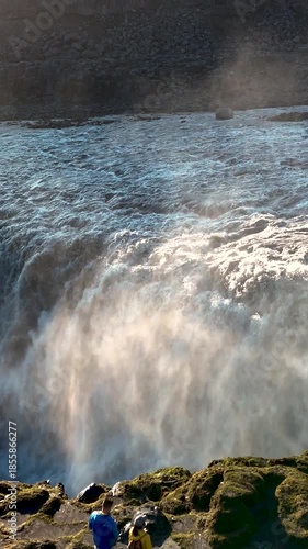 Witness the majesty of Dettifoss waterfall, one of Icelands most powerful and stunning natural wonders. The roaring water cascades down, surrounded by lush landscapes and misty atmospheres.