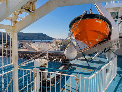 Ferry deck with lifeboats and safety equipment