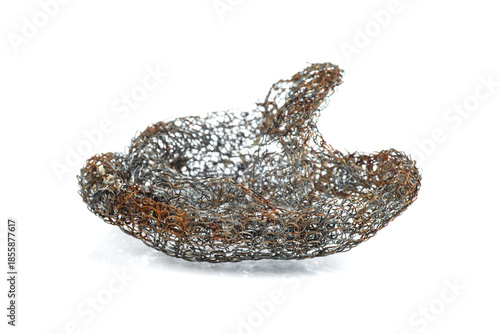 Old kitchen scrubber isolated on a white background