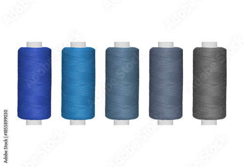 Assortment of Blue and Grey Sewing Threads: Five Vibrant Spools for Crafting and Textile Projects