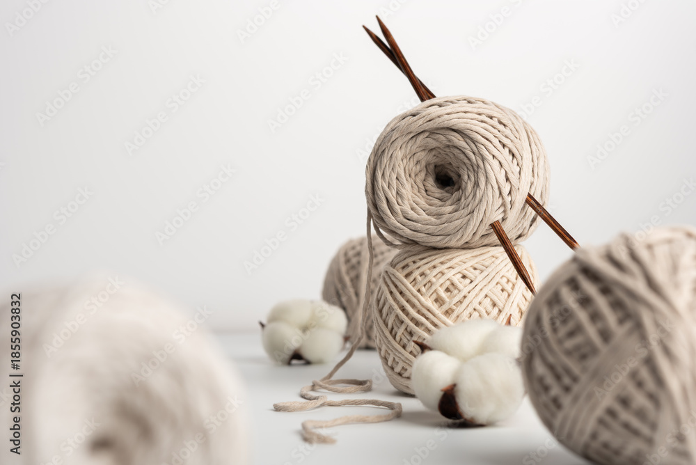 Obraz premium Cotton Yarn Balls with Knitting Needles