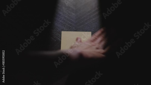 Slow motion close up footage of a hand writing out 