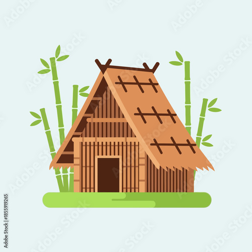 Bamboo hut with thatched roof and green bamboo stalks.