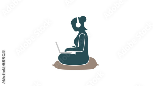 Woman Sitting Cross-legged Wearing Headphones Working on Laptop.