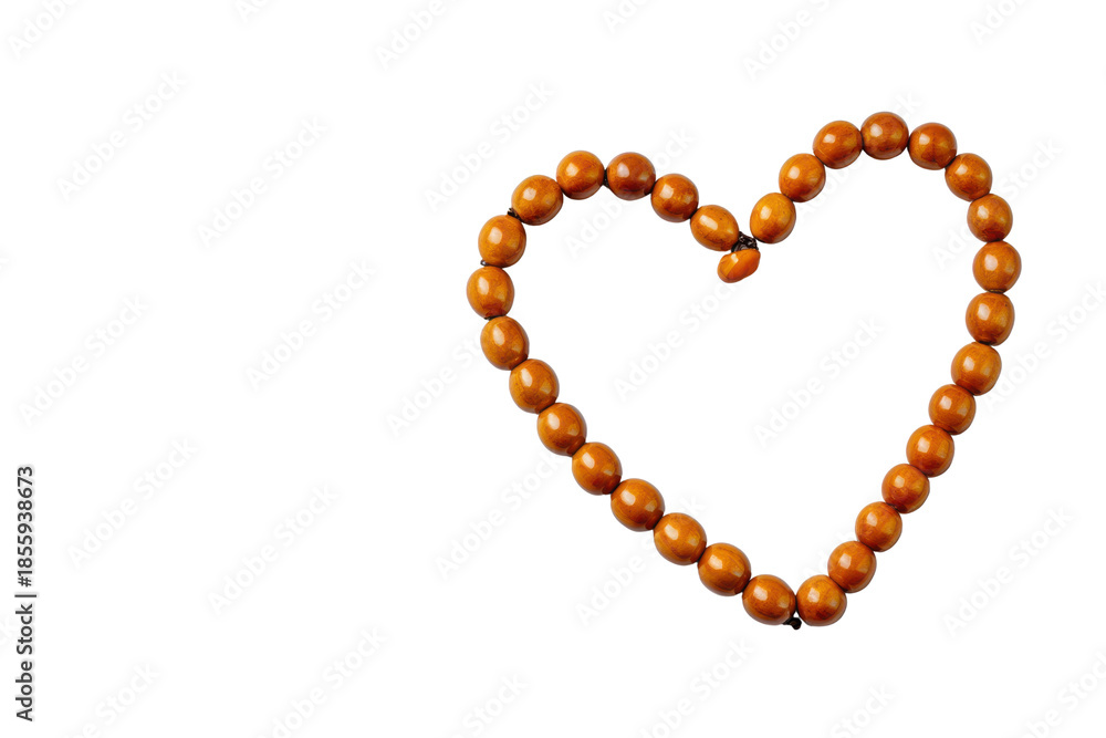 Obraz premium Heart shaped necklace made of brown wooden beads on black background image, Png, Isolated on Transparent Background, Cut Out
