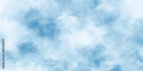 A beautiful clear blue sky with fluffy white cumulus clouds creates a natural summer cloudscape and a bright atmosphere on a sunny day