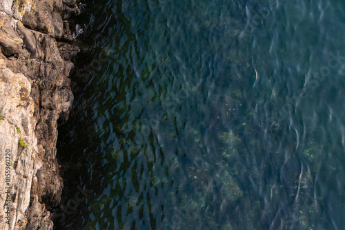 high angle view of cliff and sea surface