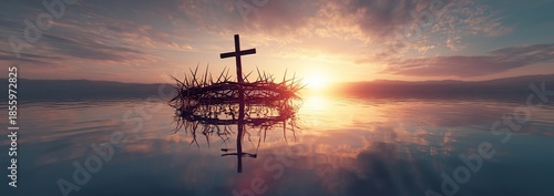 Cross and crown of thorns at sunrise, reflected on calm water, representing faith, sacrifice, resurrection, and spiritual hope.