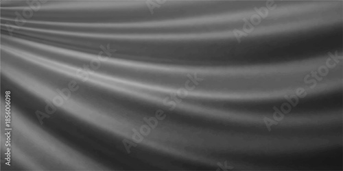 Smooth flowing black satin and silk fabric background with soft blue light waves creates a luxury textile pattern and elegant motion curves for a dark wallpaper design