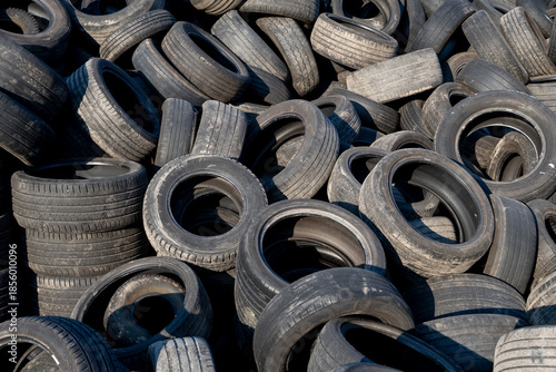 Chaotic Pile Of Discarded Car Tires Waiting For Reuse Or Recycling