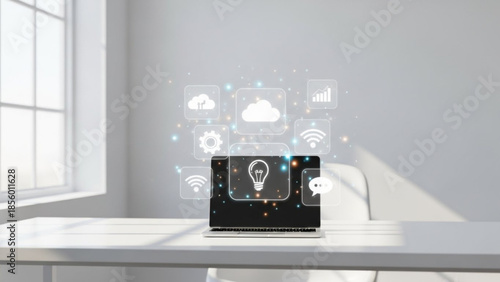 A sleek laptop on a white desk in a modern office with a lightbulb icon and various app symbols floating above the screen
