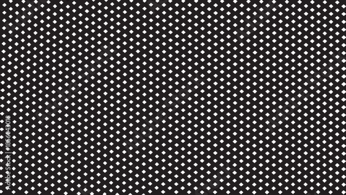 Dense pattern of small white crosses against a solid black background