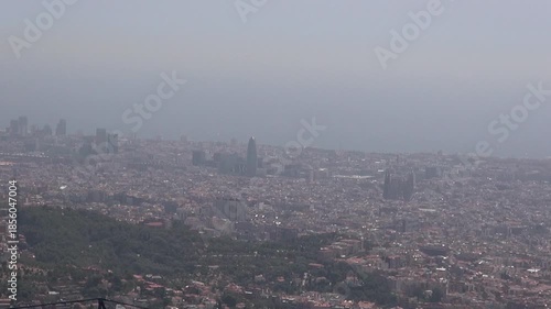 Barcelona skyscraper tower Glories sea landscape Collserola crane zoom out