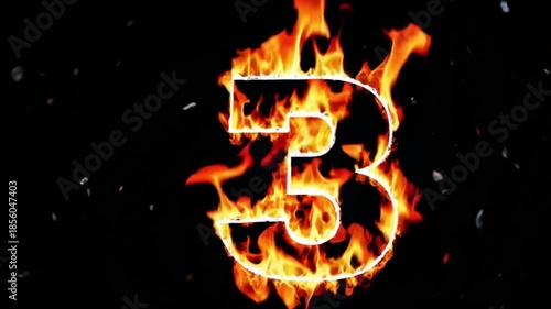 Fiery number three graphic design element showcasing intense orange and yellow flames intensely burning against a stark black background suggesting countdown urgency or a hot event promotion.