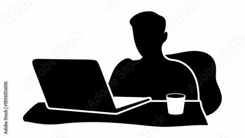 Man working on laptop with coffee